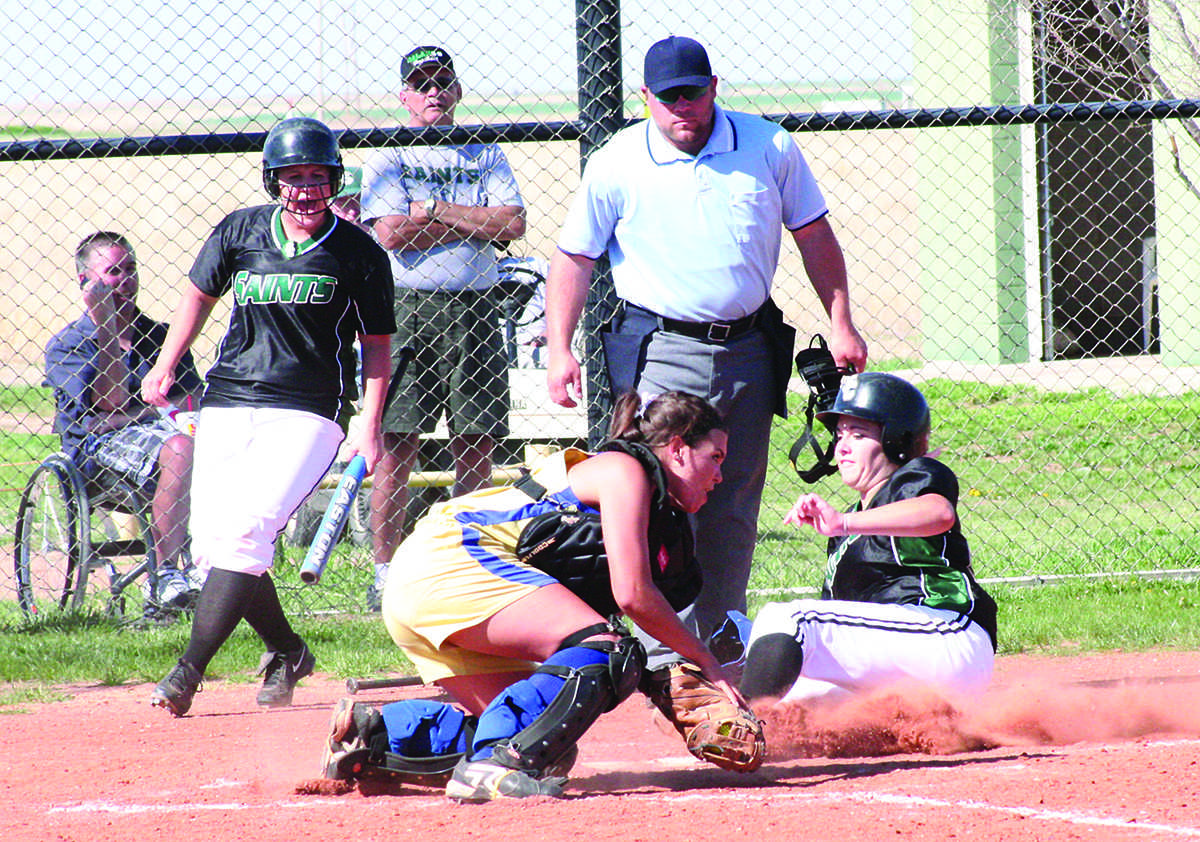 Crusader photo/Will Rector
Lady Saints second baseman Shelby Casey slides safely into home. Casey had two hits in three at-bats with three RBIs and a sacrifice fly in the second game of the doubleheader against Barton Wednesday afternoon.