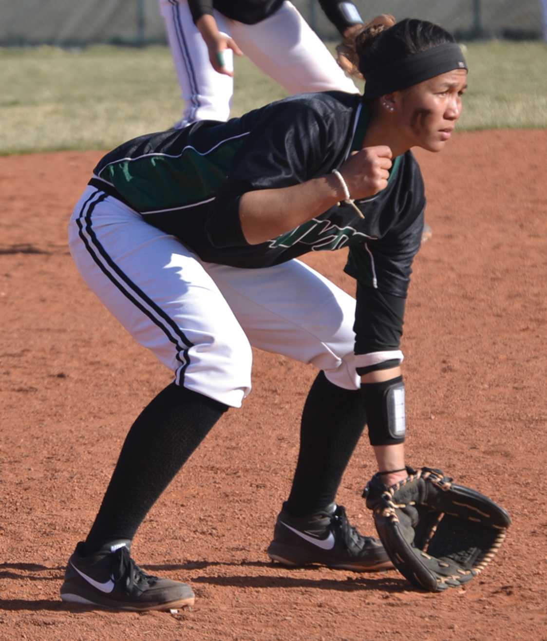 Crusader photo/Jose Medrano
Lady Saint Sierra Tadiarca waits for hit during the Lady Saints second game against Colby. The Lady Saints split the two games, Colby won the first 10-0 and the Lady Saints won the second 17-0.