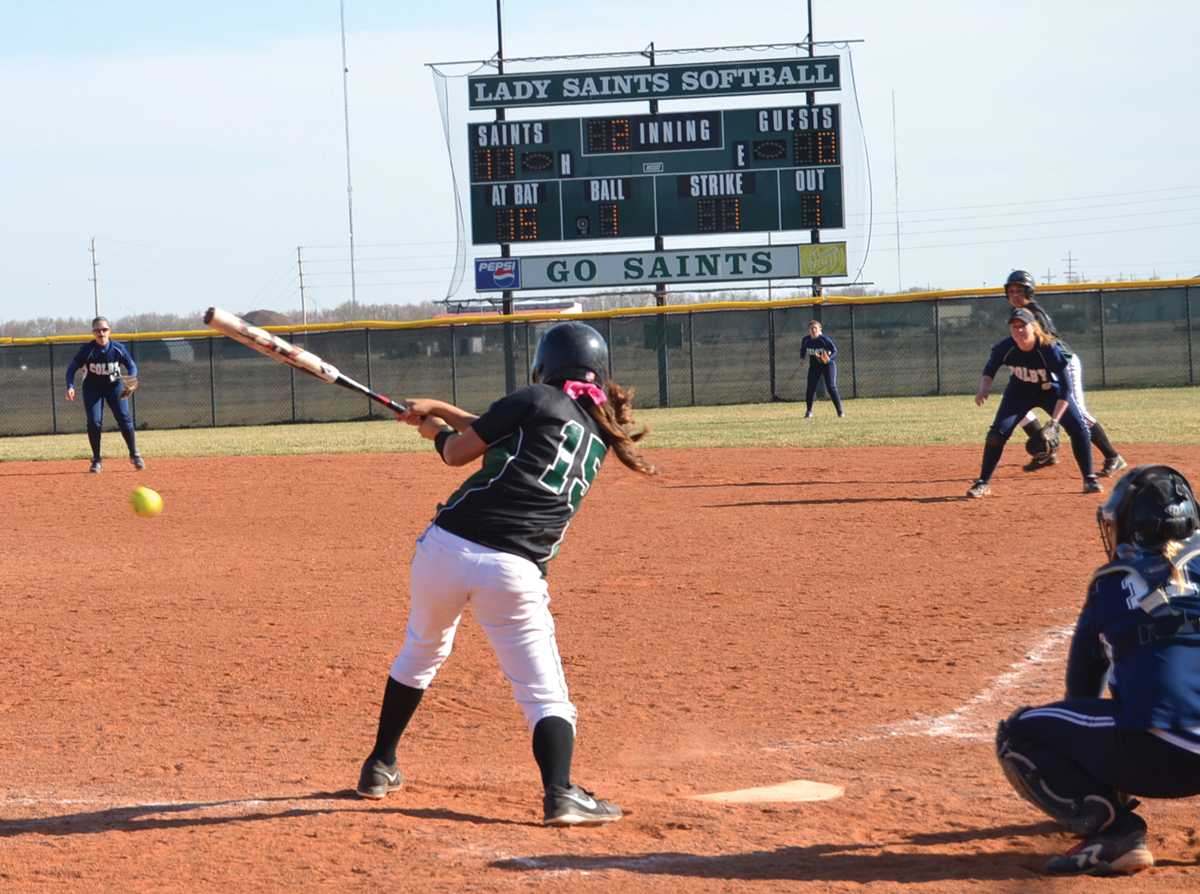 Crusader photo/Jose Medrano Lady Saint Marissa Chavez, No. 15 hits during the Lady Saints double header against Colby March 27. 