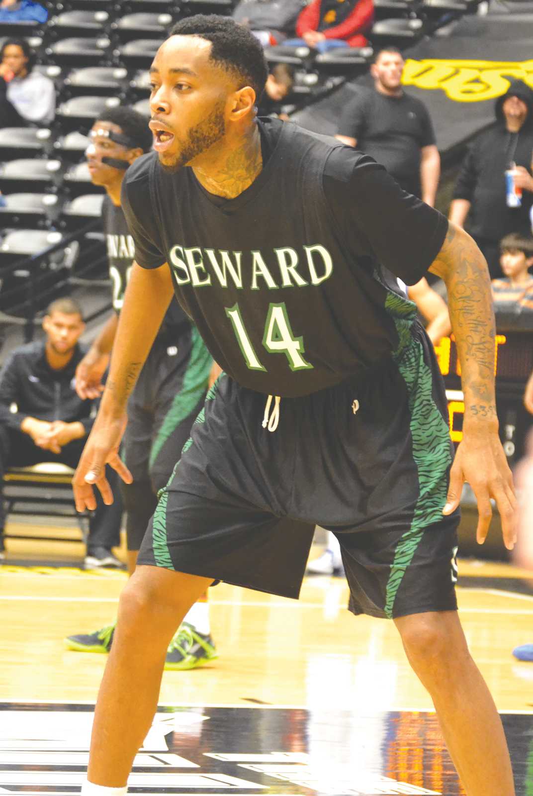 Crusader photo/Kelci Bedingfield
Quentin Purtue gets ready for defense at the Region VI playoffs in Koch Arena at Wichita. The Saints lost to the Pratt Beavers 71-68.  Niem Stevenson and Malcolm Hill-Bey were both named to the Region VI all-tournament team. 