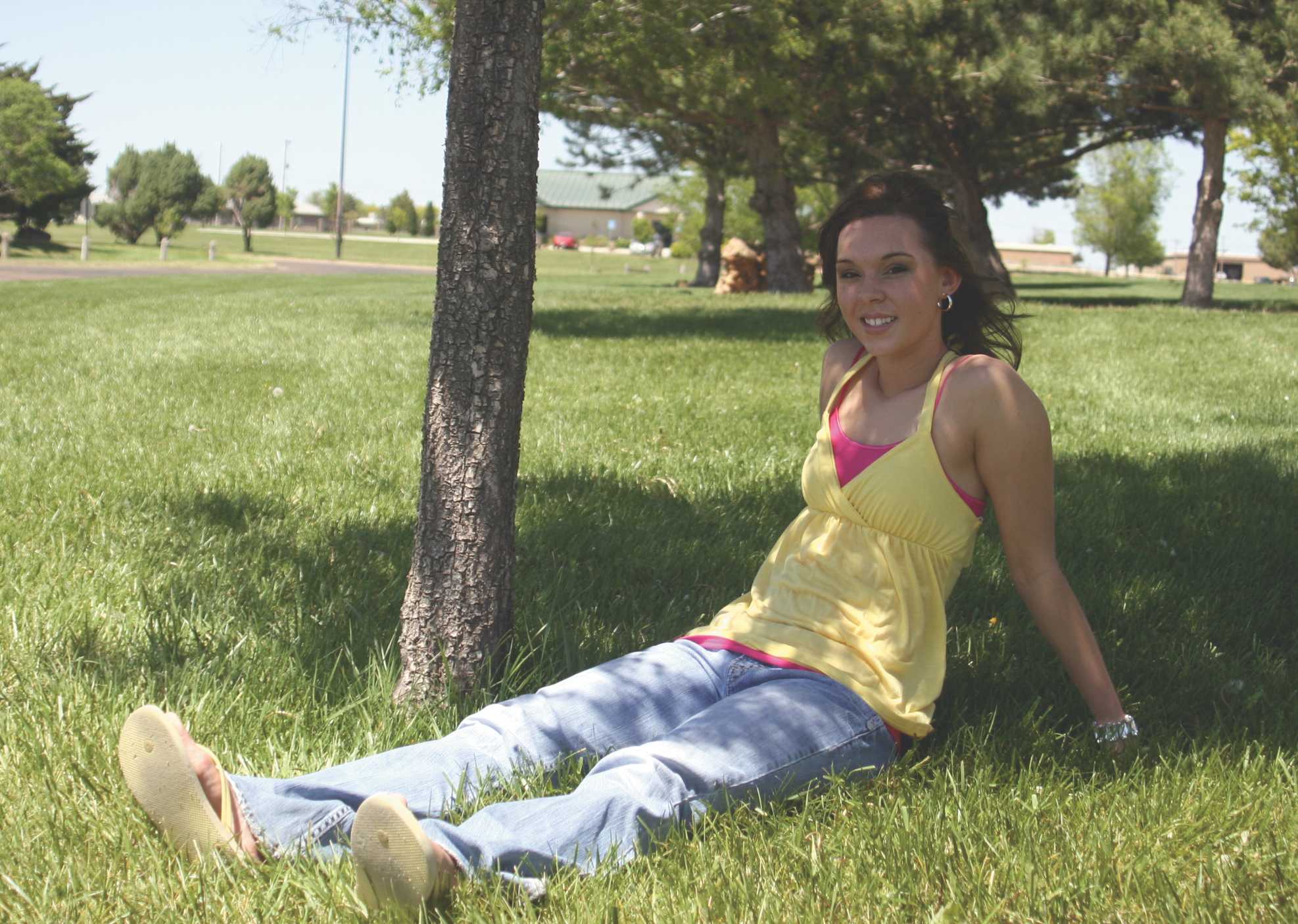 Crusader photo/Logan Green
Jordan Eder sits outside on a spring day by the Hobble Academic Building. Eder will graduate from SCCC/ATS with a degree in pre-med, and plans to further her education at K-State.