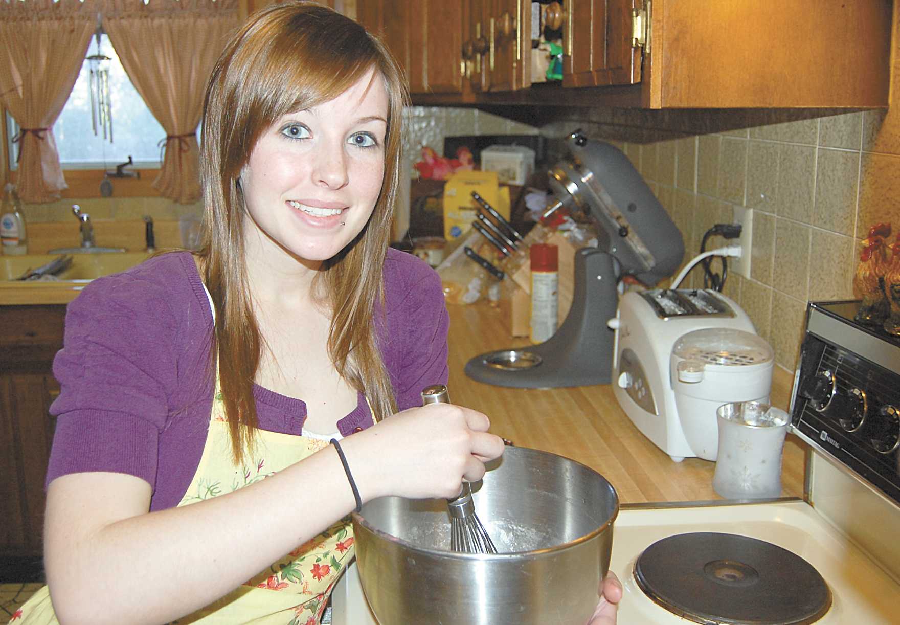 Crusader photo/ Jose Rodriguez
Allaman, the award-winning editor in chief of the Crusader newspaper at Seward, will graduate with her associate of arts degree in mass communication and move on to the world of baking where she will start the first layer of her life.