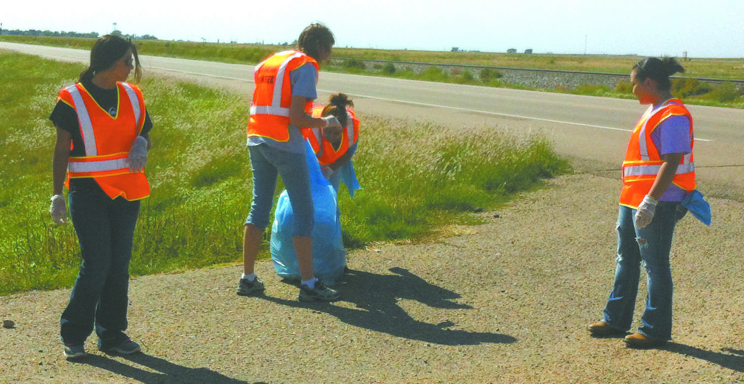 PTK members Selene Perez, Beth Beard, Josefina Alvarado and Nyra Rin remove trash on Highway 54. PTK does this biannually.
