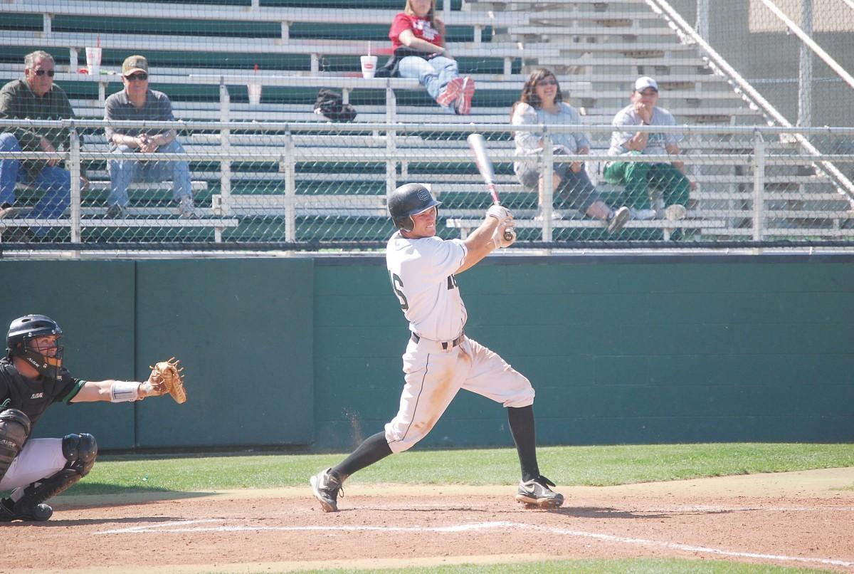 Crusader photo/Will Rector
Kelby Tomlinson connects on a base hit against Clarendon on Tuesday. Tomlinson’s homerun in the eighth would not be enough to put the Saints on top as they lost 8-7. Tomlinson was 4-5 in the game with four runs scored, a stolen base and an RBI from his homerun.