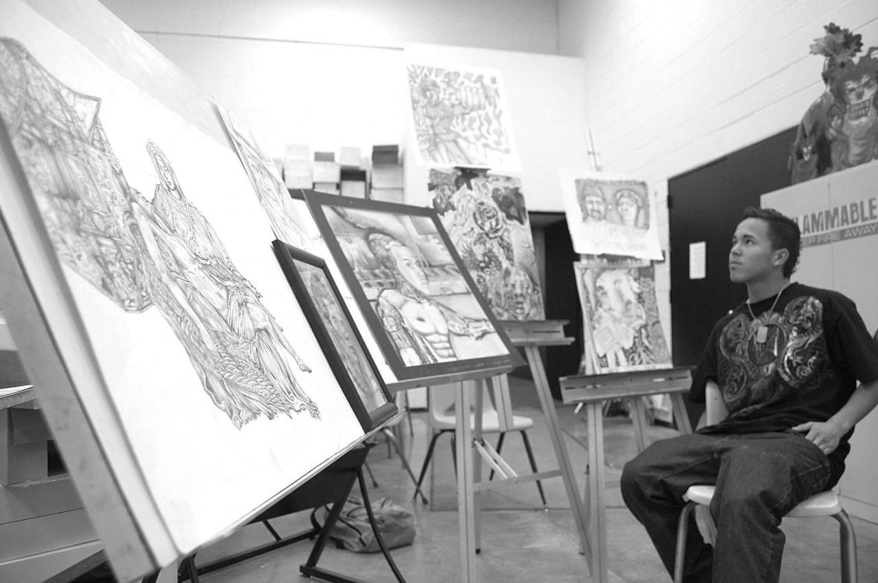 As Omar Rios explains his idea for his latest drawing of having a satisfied Michelangelo peering over several of his classic works of art, one couldn’t help but see a resemblance as Rios looked over some of his own favorite drawings.