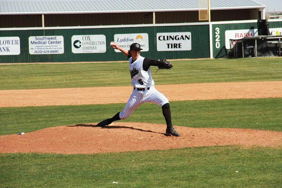 Crusader photo/ Maria Lara
Right handed pitcher and starter, JB Olsen, breezed through the­­­­­­­­­ 3rd inning on March  preventing any base-runner press forward from the Pratt Beavers and aiding the Saints to defending their lead. 