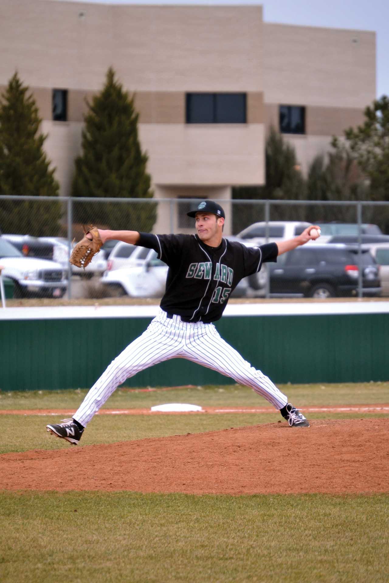 Crusader photo/ Efren Rivero 
Hayden Howard pitches on the cold season opener against McCook Community College. Saints have a season record of 3-4 after having an early start to the season. Saints will face Odessa College Saturday.