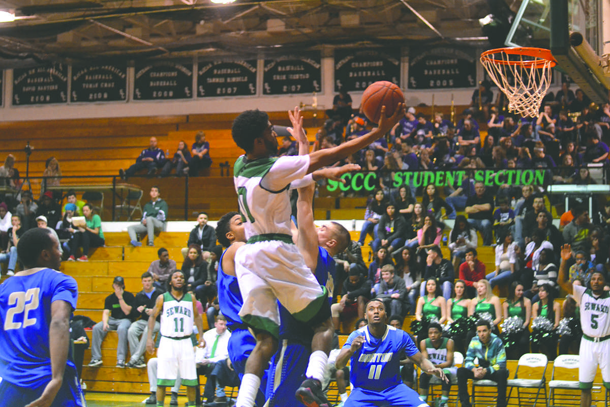 Crusader photo/Diana Chavira
Kevin Sims goes up for one of his 26 points scored for the night against Barton County. Sims reached a new career high that included shooting 17 times from the free throw line and helping put Seward in the lead.