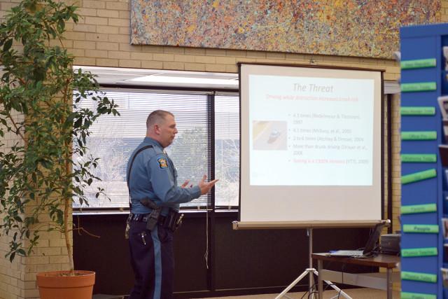 Crusader photo/Tania Valenzuela Resource officer Michael Racy presenting distracted driving seminar to audience in SCCC/ATS library.