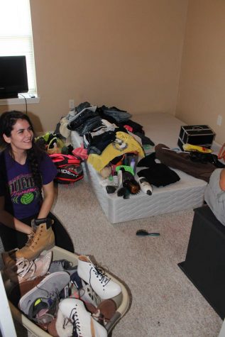 My new roommate, Daniela, moving into her room. She has a some organizing to do. 