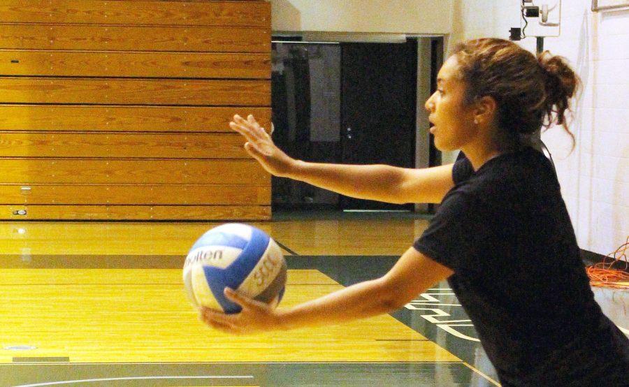 Practicing service is important. Preseason practice for Saints volleyball started before classes.