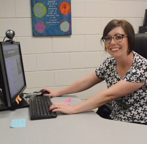 Mariah Cline prepares to start her work day. Students are used to seeing Cline’s face in the student success center. 