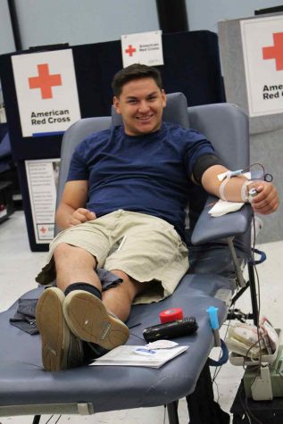 Students at SCCC are always looking for ways to save a life. Miguel Rogers, donates some of his blood for a good cause. 