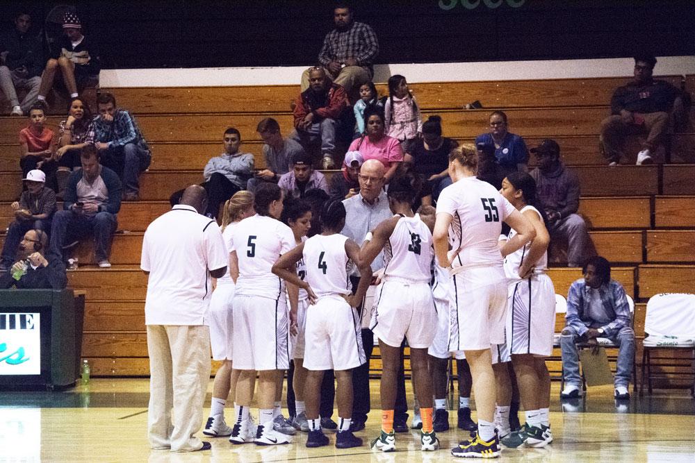 Coach Toby Wynn gives his team some encouragement during a time out.