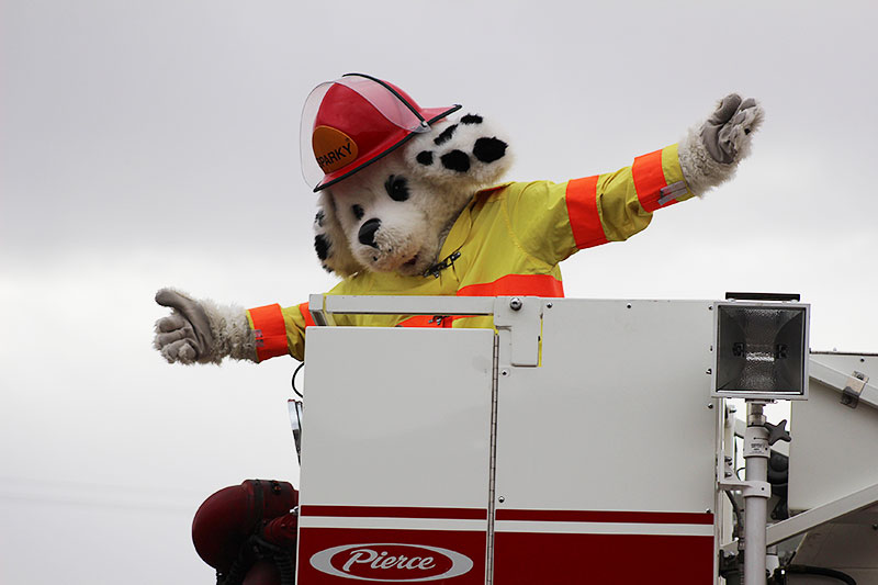 Fire department’s mascot Sparky, has a little fun posing for the camera