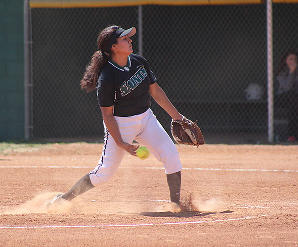 Pitcher Monique Ashley rounds up to dish out a fast ball. Ashley has had 148 strikeouts already this season. 