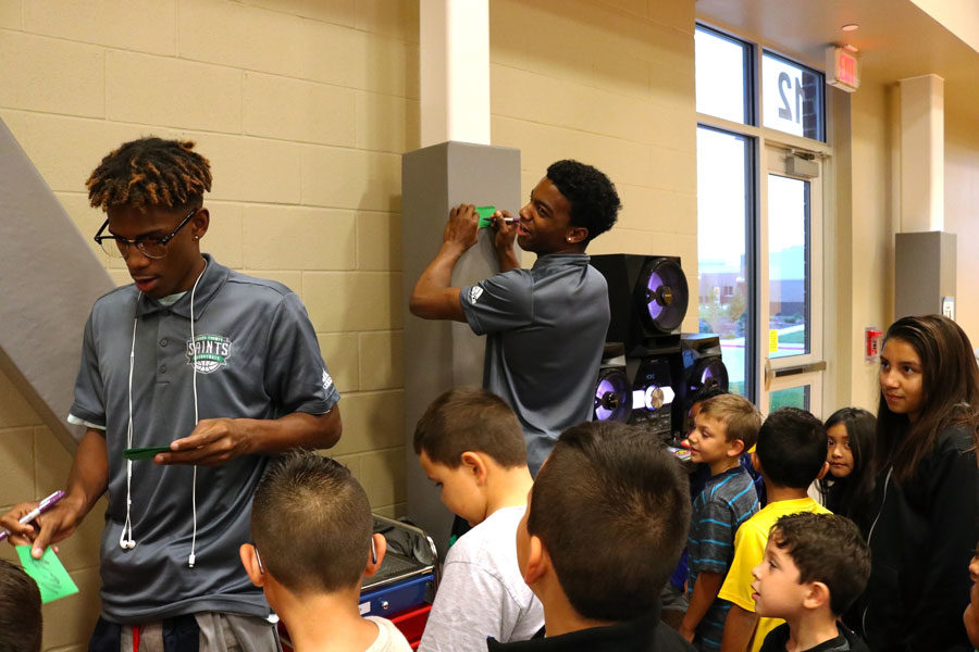 SCCC Mens Basketball players Tre Flowers and Jared Bennett give countless of autographs to the Prairie View students on Wednesday morning. Many students surrounded Flowers and Roberts begging for many autographs and greetings. 
