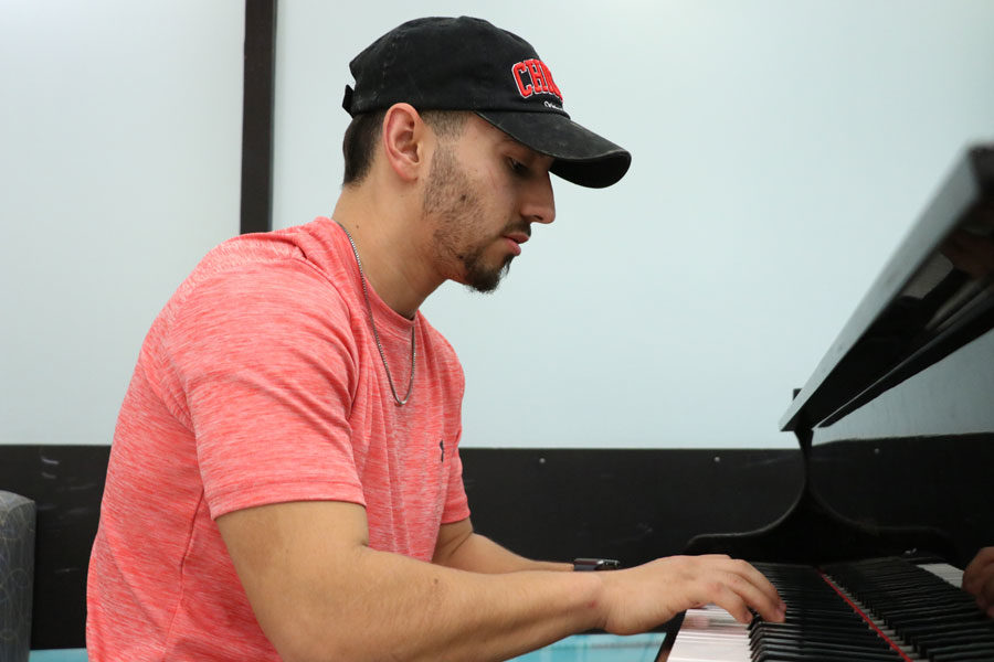 Sophomore Sergio Peregrino enjoys playing the piano before and after classes. Peregrino knows how to play the drums, the guitar and the piano. 