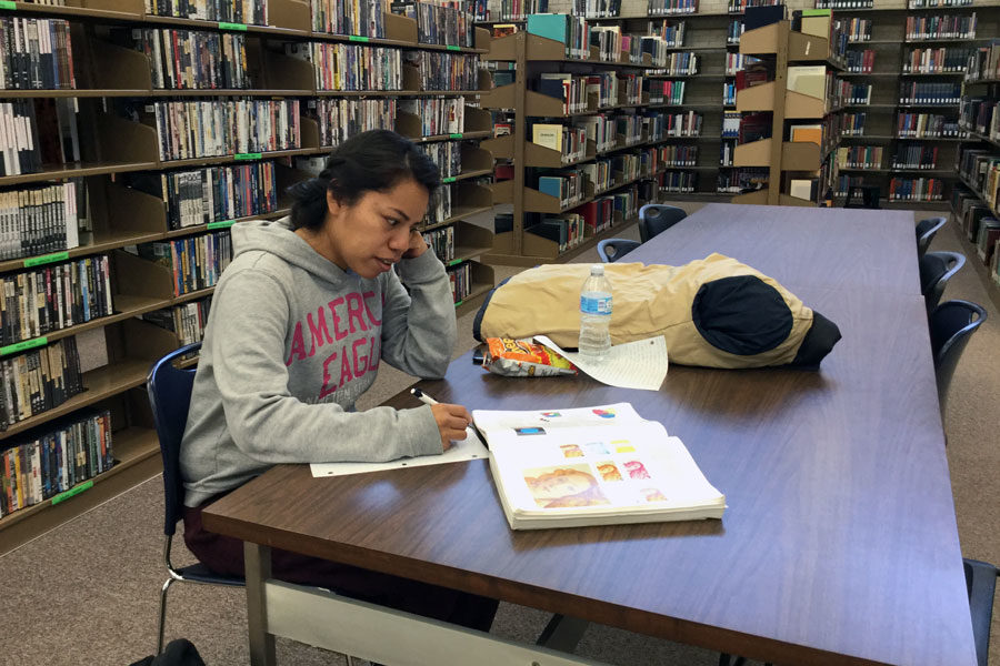 Sophomore, Neri Martinez, spends time in the library working on her homework when she doesnt have classes.