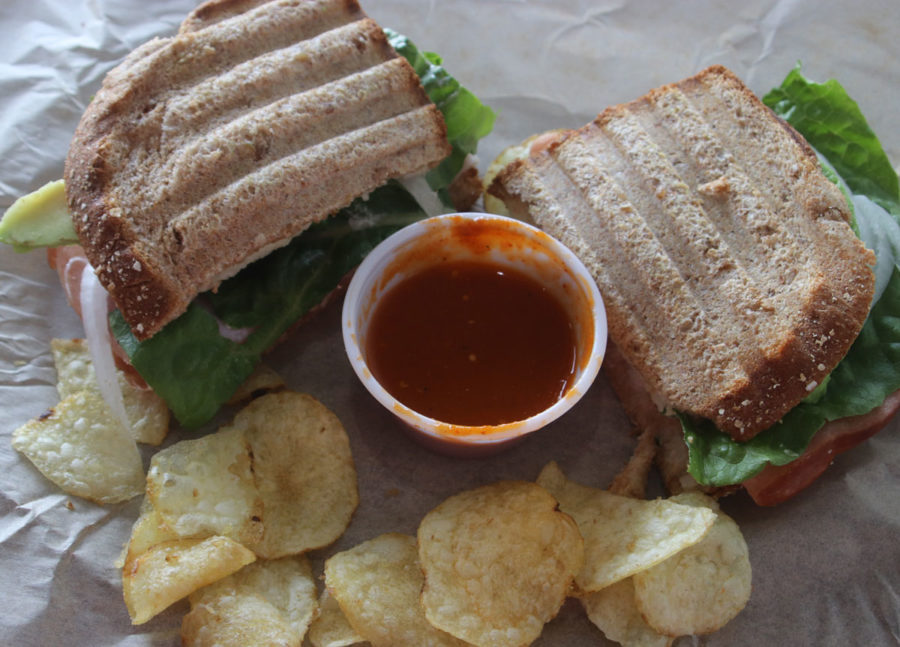 The Mana Club is made of whole wheat bread, mayonnaise, avocado, deli ham slices, muenster cheese, lettuce, tomato, and onion.  This savory sandwich delight is the signature sandwich of Dulce Mana.