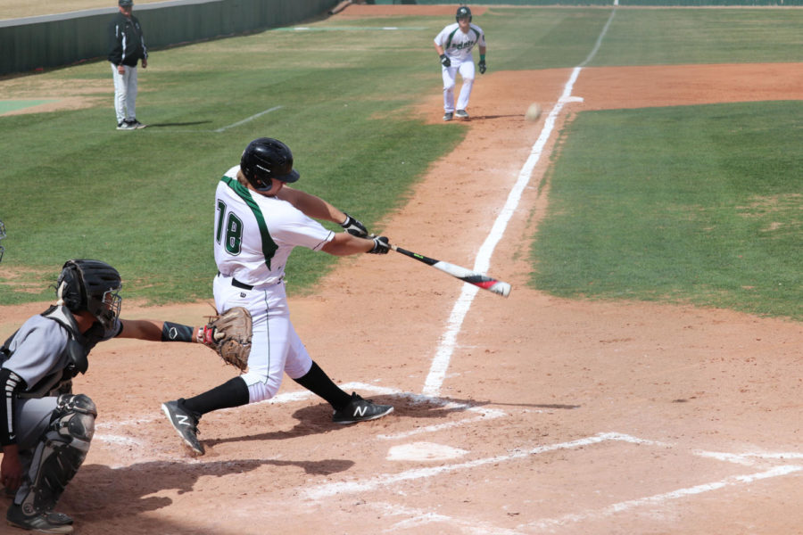 Sophomore, Montana Newell hits a ball towards the left side of the field. 