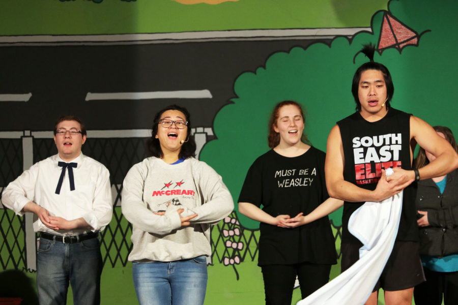 Members of the cast for “You’re a Good Man, Charlie Brown, perform the title song in Act I of the musical during rehearsals. Opening night is Friday, April 13.

