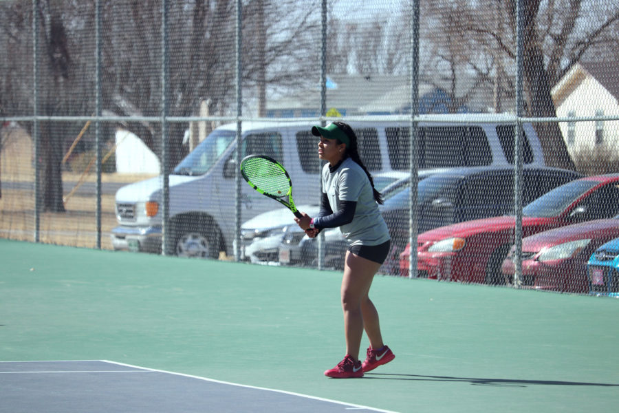 Freshman Patricia Panta prepares to receive a serve from an opponent. (File Photo)