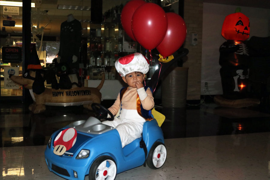 Toad, also known as Andres Dominguez, poses for a quick shot in his race car. Toad is character from Super Mario Brothers.