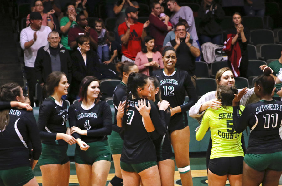 After winning the Region VI Championships, the Lady Saints were filled with many emotions on the court.