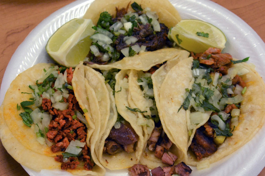 Most+tacos+have+onion+and+cilantro+to+top+it+off.+This+plate+of+tacos+was+%246.25+along+with+six+salsas+and+two+limes.+For+the+tortillas%2C+instead+of+putting+butter+they+put+lard+to+make+the+tortillas+softer+and+lard+gives+the+tortilla+a+pork+taste.+