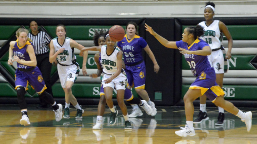   The Lady Saints fight for a loose ball against Dodge City on Jan 19. The Lady Saints played in the Greenhouse vs Dodge City. Seward won 63-51.
