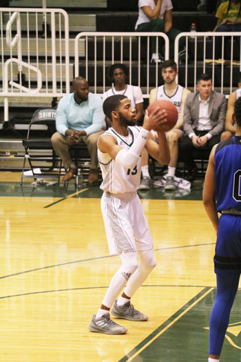 Reggie Miller, sophomore guard, helps out the Saints by making both free throws and leading the Saints to a win.