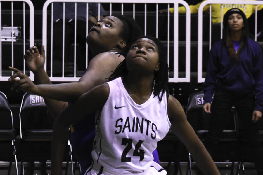 Vonda+Cuamba%2C+freshman+forward+from+Maputo%2C+Mozambique%2C+boxes+out+for+a+rebound.+The+Lady+Saints+squeaked+past+Garden+City+Community+College+on+Jan.+14+and+brought+their+record+to+14-2+overall+on+the+season.+%28File+Photo%29