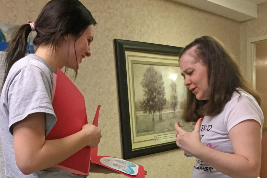 Students created homemade valentines cards and then delivered them to area nursing homes. The Lady Saints Volleyball team were among those who visited with residents.