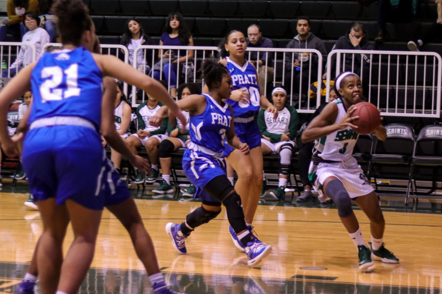 Freshman gaurd Aquila Mucubaquire goes up to make a shot against the Pratt Lady Beavers on Feb. 9 in the greenhouse. 