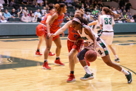 Lady Saints slay the Dragons, earn conference title