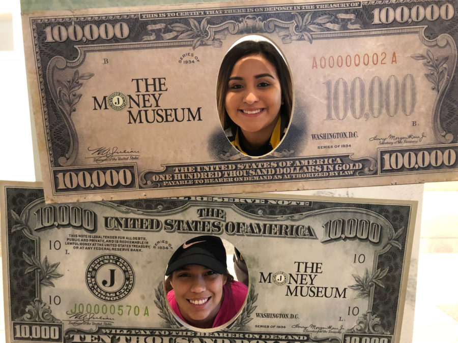 Monica Gonzalez, photographer/social media director, and Alondra Botello, reporter, put their faces on the front of some life-sized bills. Crusader staff visited the Money Museum in Kansas City, Missouri.