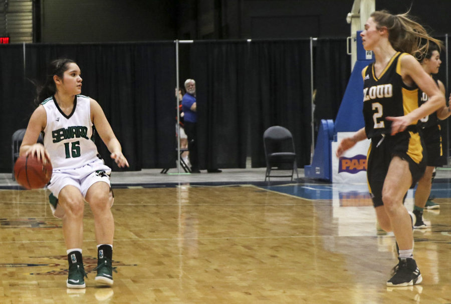Ali Lucero, guard from Liberal, brings the ball down to end the court to bring the game to an end against the Lady Thunderbirds. SCCC won 74-59 and advanced to the semifinals. They play at 3 p.m. Monday against Barton.