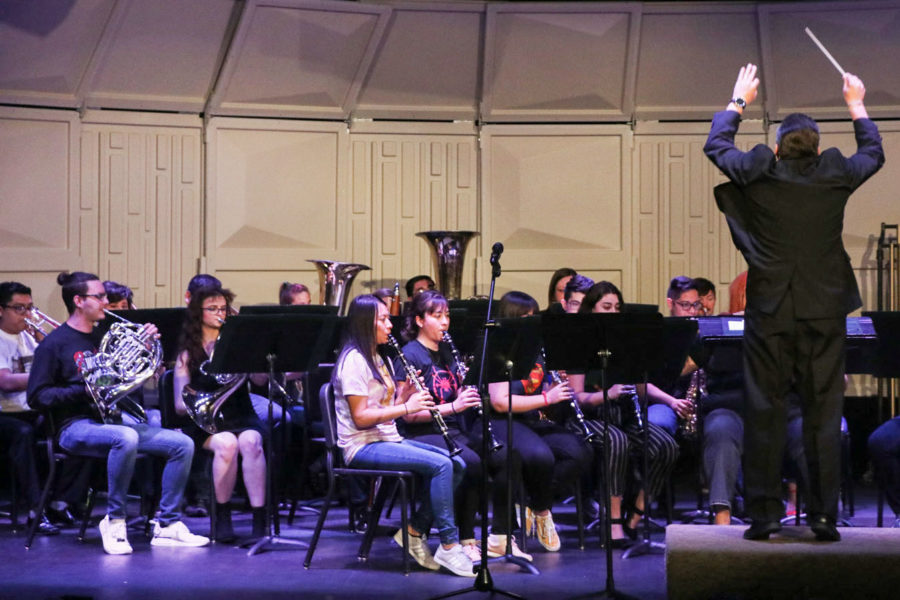 Darin Workman, SCCC band and instrument director directs SCCC students in the concert on April 26. The band performed several songs from the Marvel universe franchise. 
