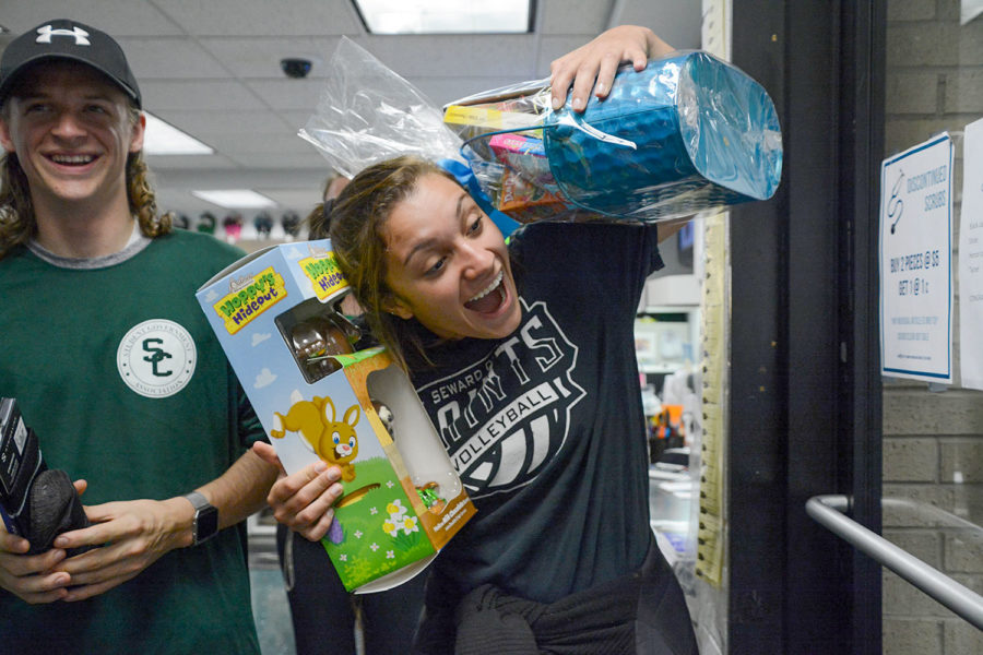 Nati da Rocha gets excited about winning the giant chocolate bunny. The Easter egg she found in the bookstore matched up to this prize. More than 300 eggs were hidden but not all offered prizes.
