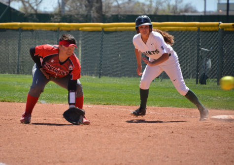 Miranda Nester leads off first base just after the Northwest Technical College pitcher releases the ball. The outfielder from Anaheim, California is a threat on the base path. She has stolen eight bases this year.