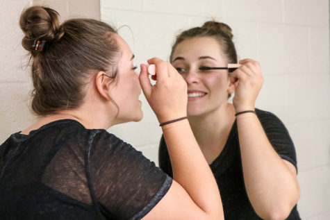 Cosmetology students learn that less is more when doing their own make up or others.