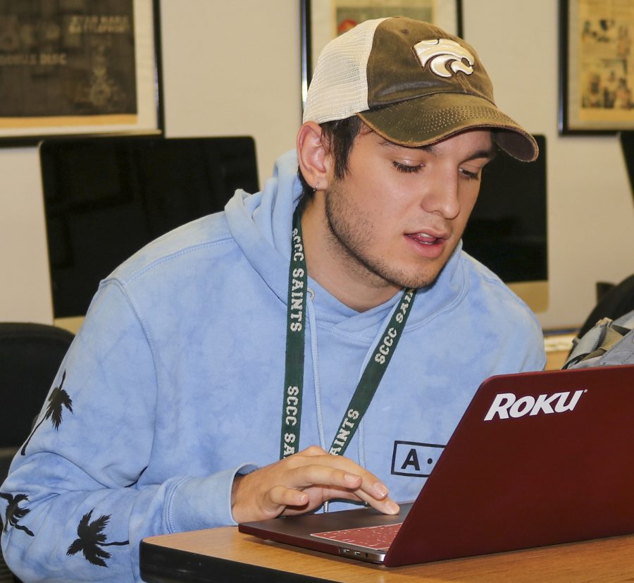 Preston Burrows works on an AP style quiz during Crusader class. The freshman from Rolla is in his first semester publishing for the student media website.