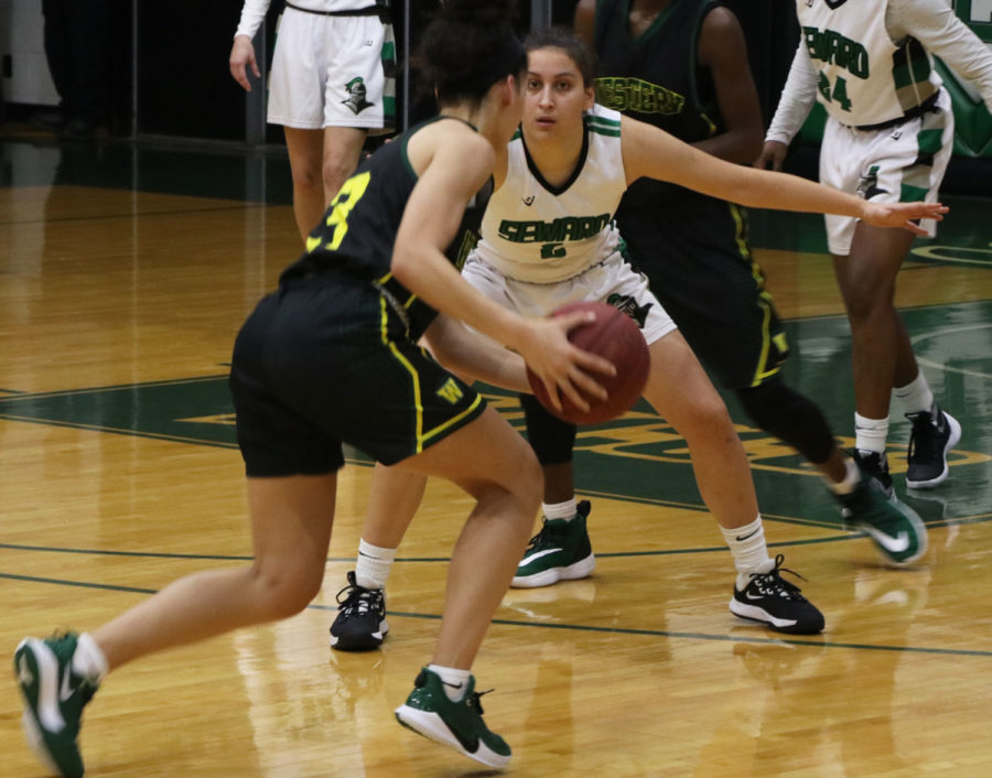 Freshman Wiktoria Kazimierowicz, plays a great defense, not letting any of the Lady Pioneers inside the lane for a layup.

