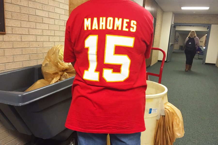 Custodian Chris Schroeder shows off her Patrick Mahones Kansas City Chiefs jersey before the 2020 Super Bowl on Feb. 2. The Kansas City Chiefs and the San Francisco 49ers will be competing.  