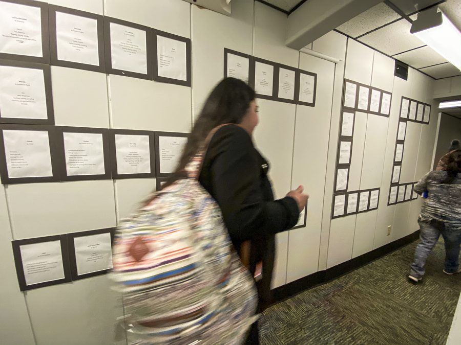 When class is over, students weave their way through the small building to exit. The walls of Colvin are decorated with projects by students. This one features short poems and serves as a reminder of one of the learning center’s goals — to help adults continue on with college level courses at the main SCCC campus.
