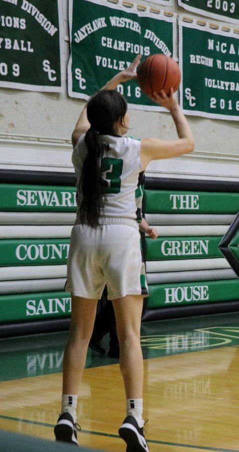 Gina Ballesteros shoots a three pointer but misses it. Ballesteros is a freshman at SCCC, coming from Ulysses. 
