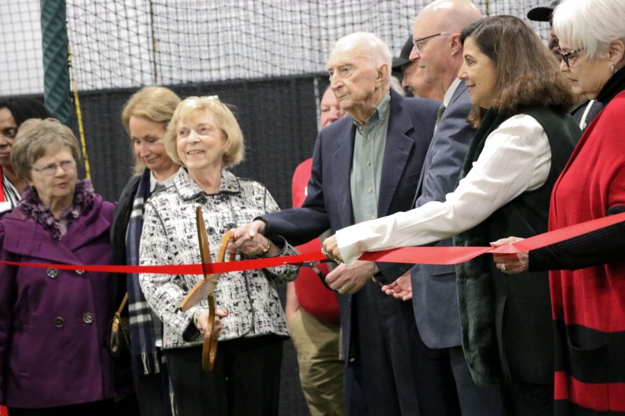 Ribbon cutting makes it the official opening of the Sharp Family Champions Center. Jo Ann and Gene Sharp are the lead donors, who also cut the ribbon. 
