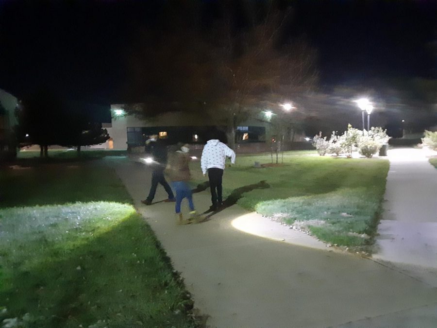 Many students came to participate in the nighttime egg hunt even though it was a bit cold during on Oct. 29. Students used flashlights to hunt for prizes.