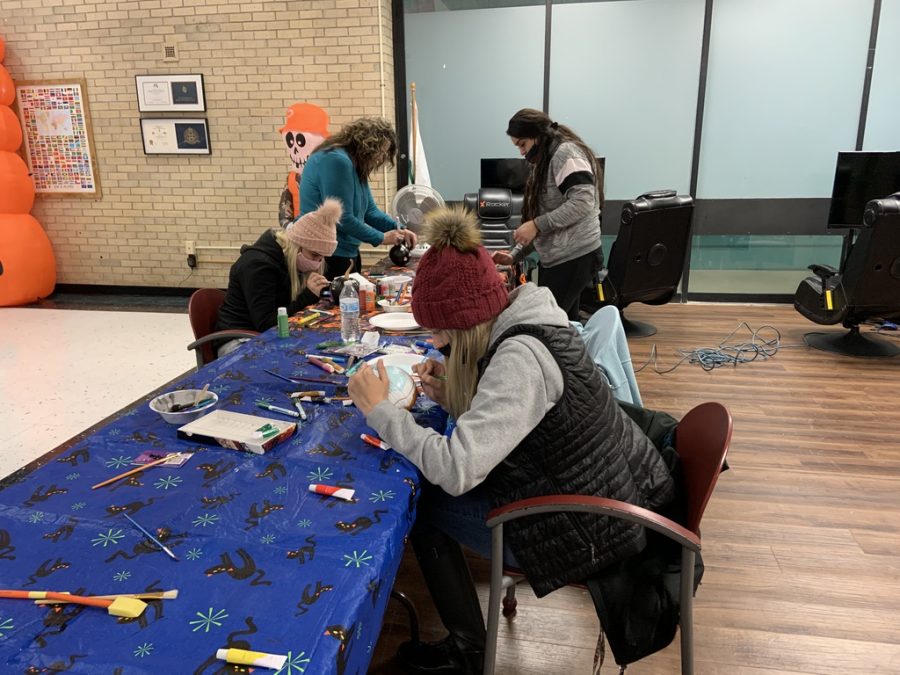 Not many students showed up to paint he pumpkins as some unexpected snow hit the night before but regards some students came to participate in the fun pumpkin activity 